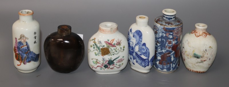 Five 19th century Chinese porcelain snuff bottles and a smoky quartz snuff bottle